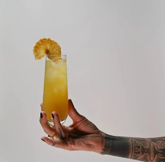 Turmeric Ginger Elixir (nolo) – “Pineapple Turmeric Spritz”